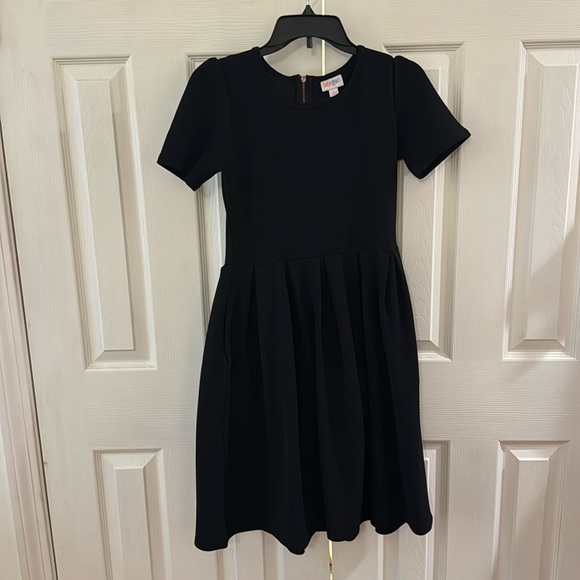Black LuLaRoe dress with pockets and back zipper. Great condition size small - Picture 1 of 2